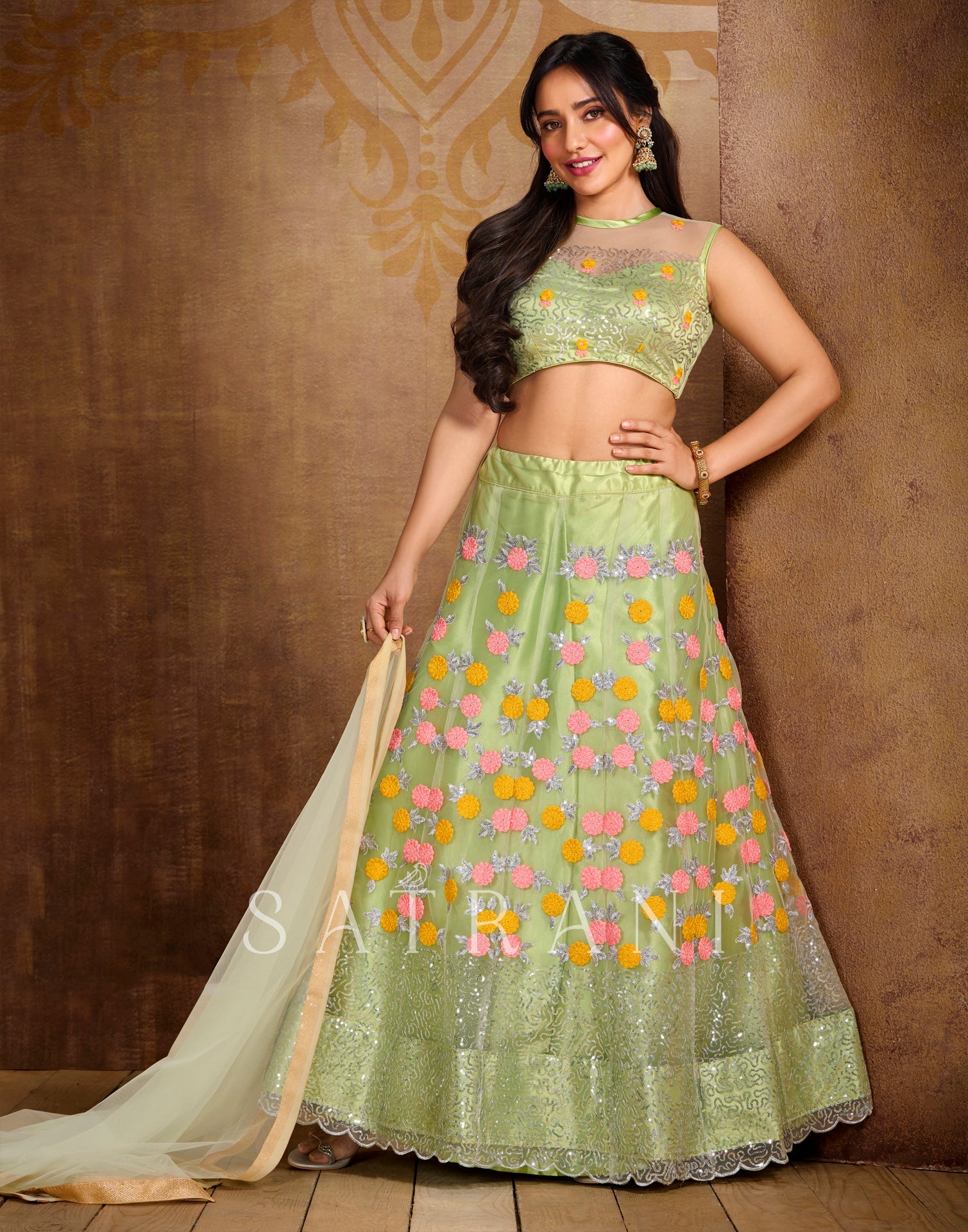 Pista Cream Coloured Net Sequence Embroidered Partywear Lehenga | SLV125L10496