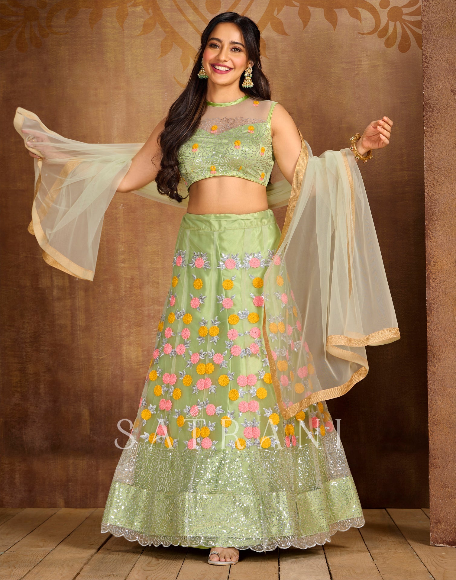 Pista Cream Coloured Net Sequence Embroidered Partywear Lehenga | SLV125L10496