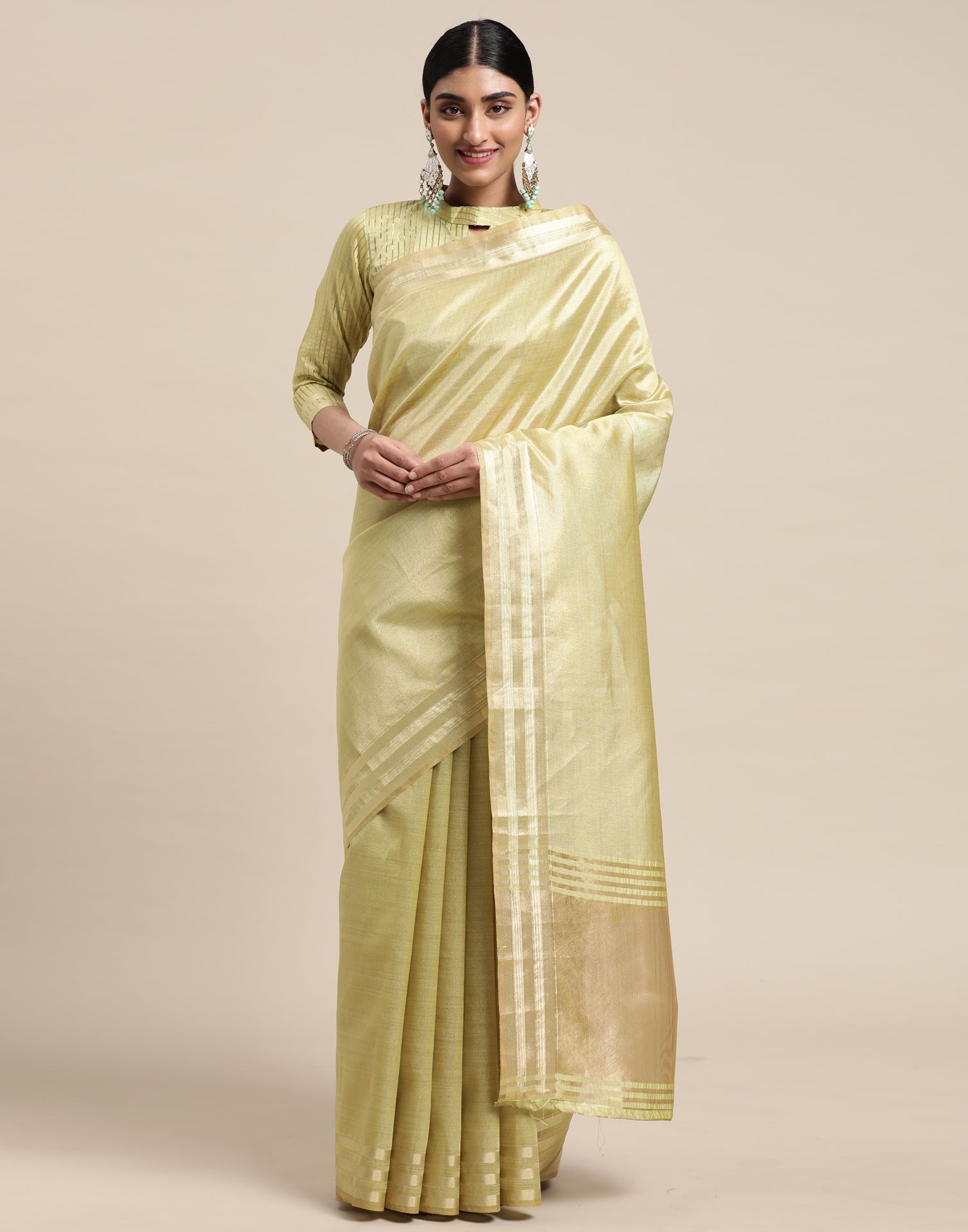 Pista And Golden Silk Saree