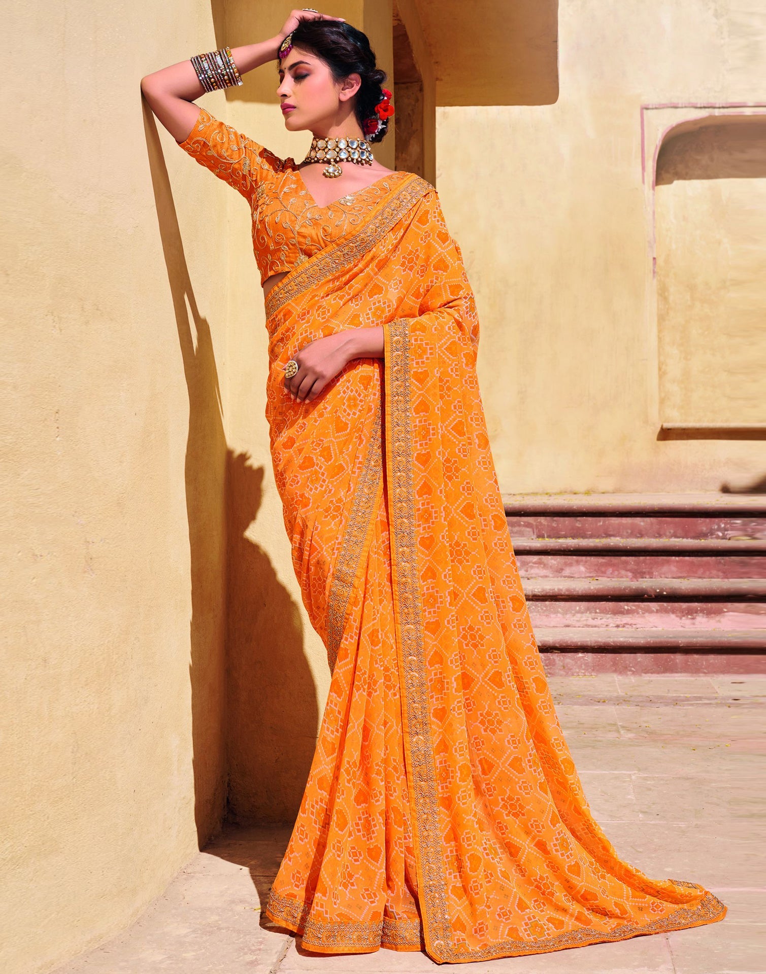 Light Orange And Multicolored Georgette Saree