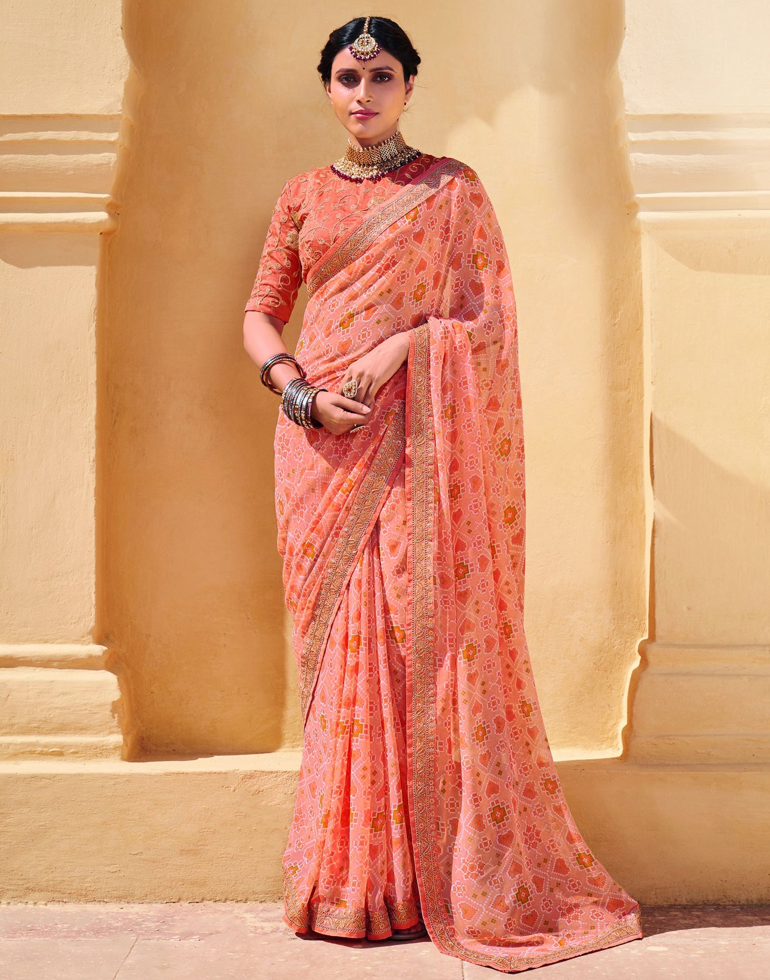 Peach And Multicolored Georgette Saree